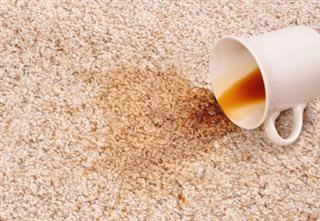 Carpet with coffee stain.