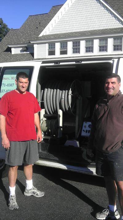 Charlie and Paul Spinos with the high powered truck mounted carpet cleaning system
